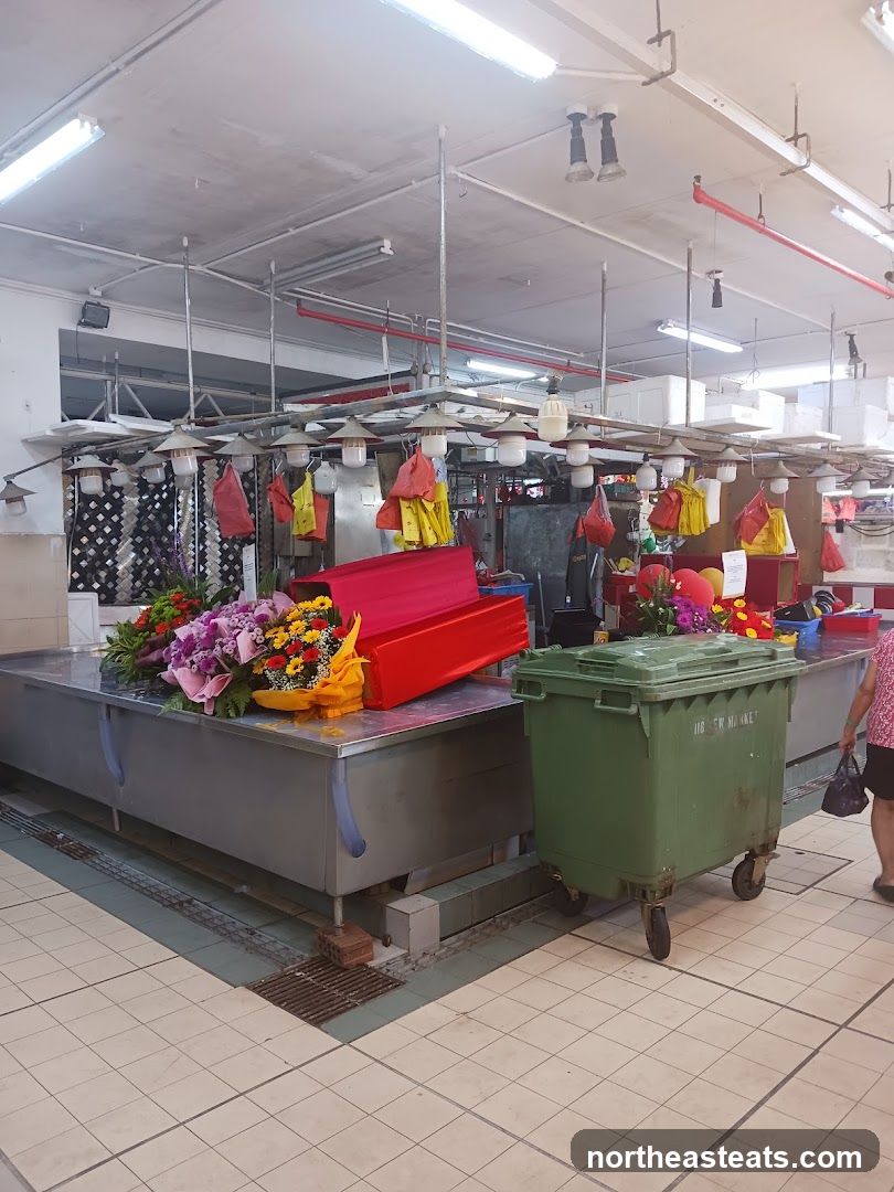 Market Stall with Flowers and Bins