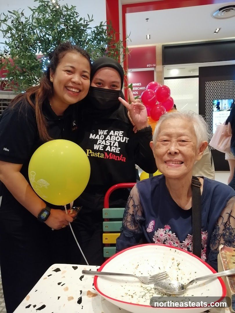 People celebrating at Pasta Mania