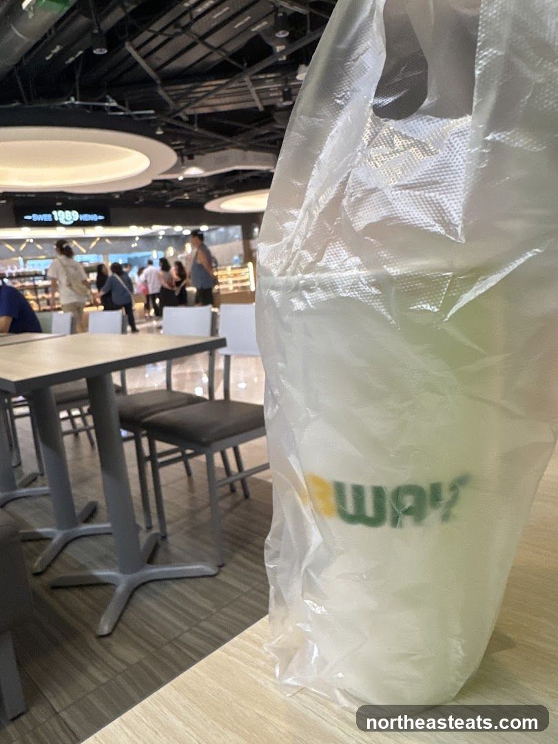 Subway cup in plastic bag