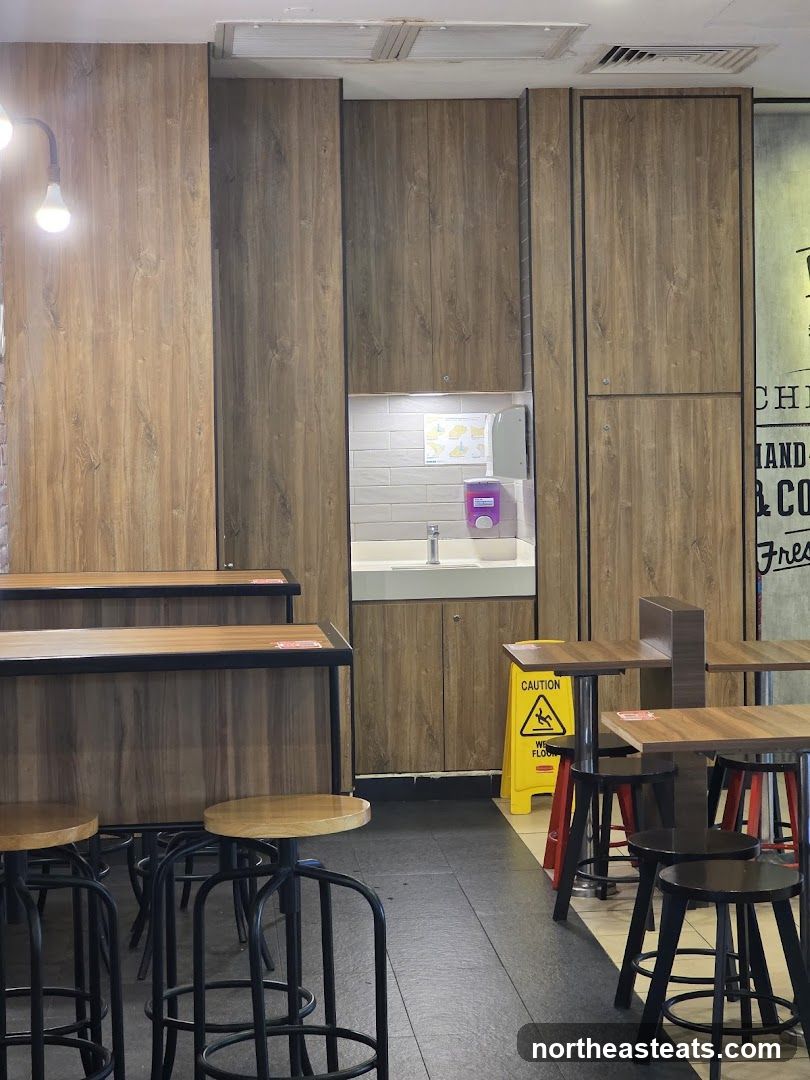 Restaurant Interior with Seating and Sink Area
