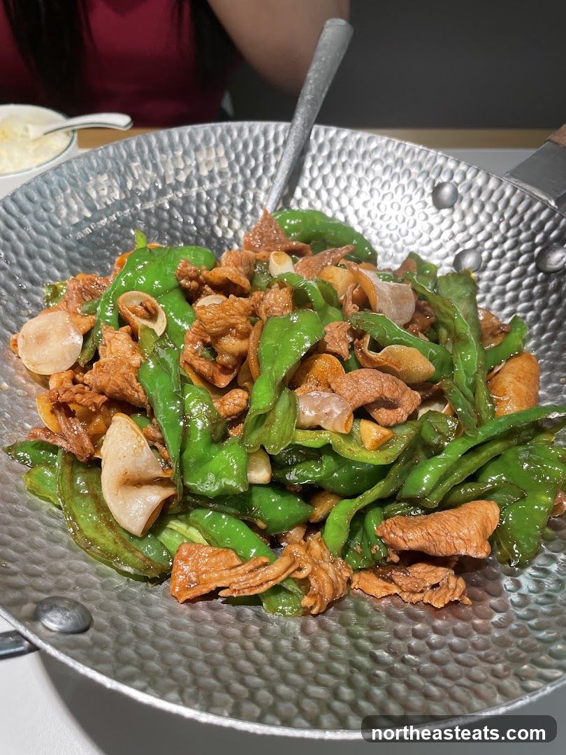 Stir-fried dish with green peppers and meat