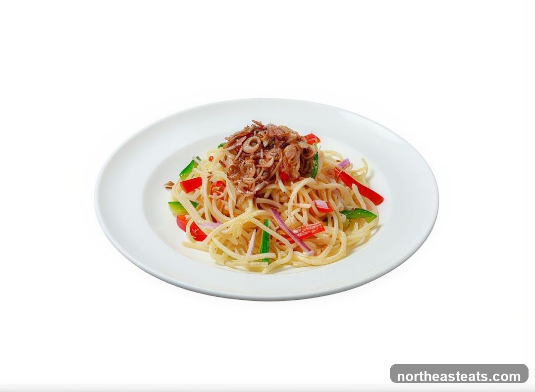 Spaghetti with vegetables and crispy shallots