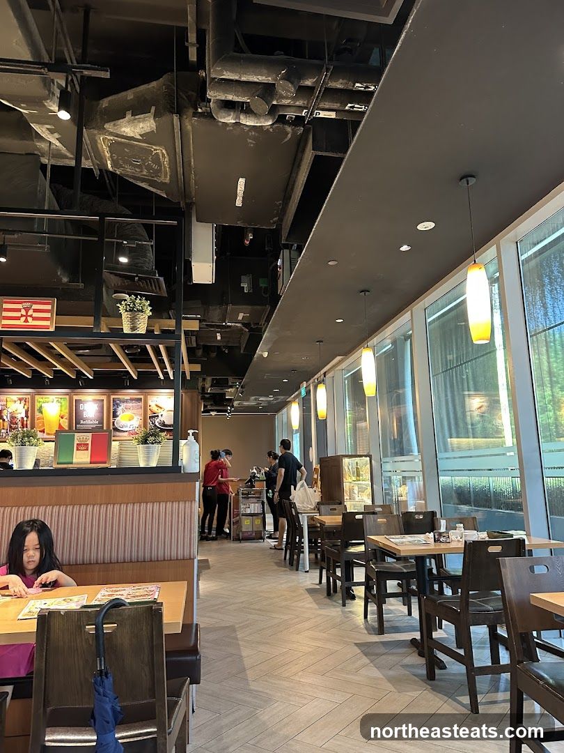 Restaurant Interior with Dining Tables and Staff