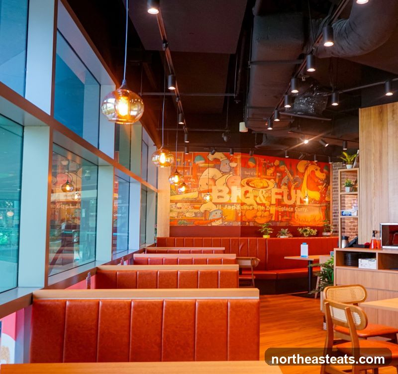Restaurant Interior with Booth Seating and Mural
