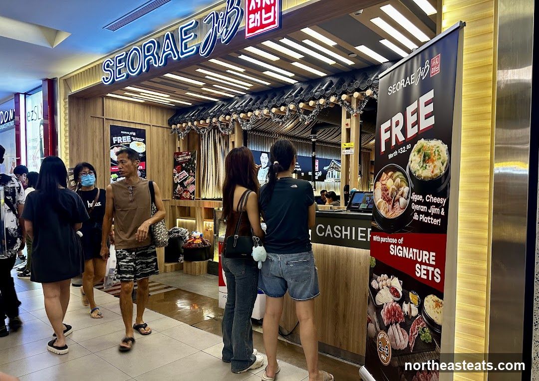 Restaurant storefront with promotional banner