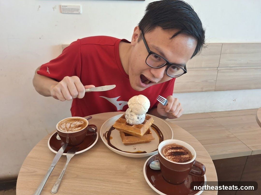 Man with Waffles and Coffee