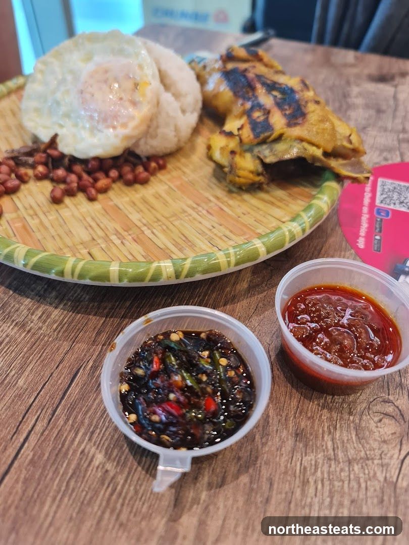 Nasi Lemak with Fried Egg and Grilled Chicken