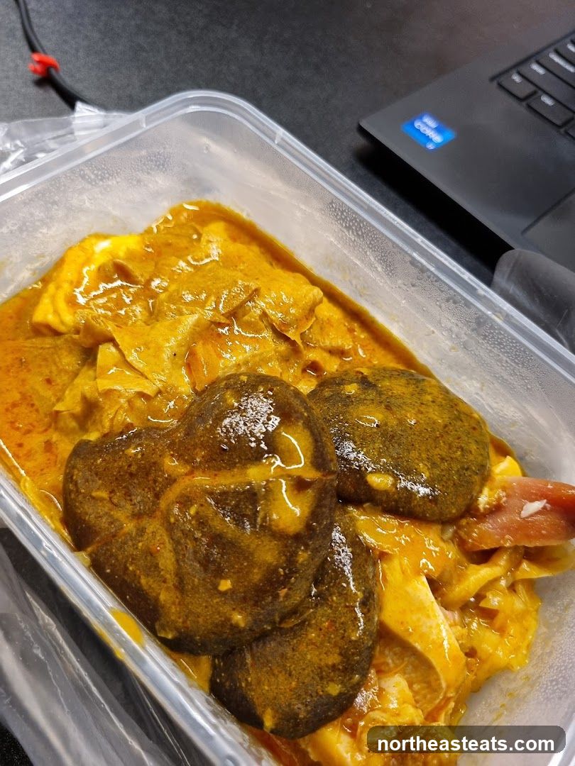 Curry dish in a plastic container