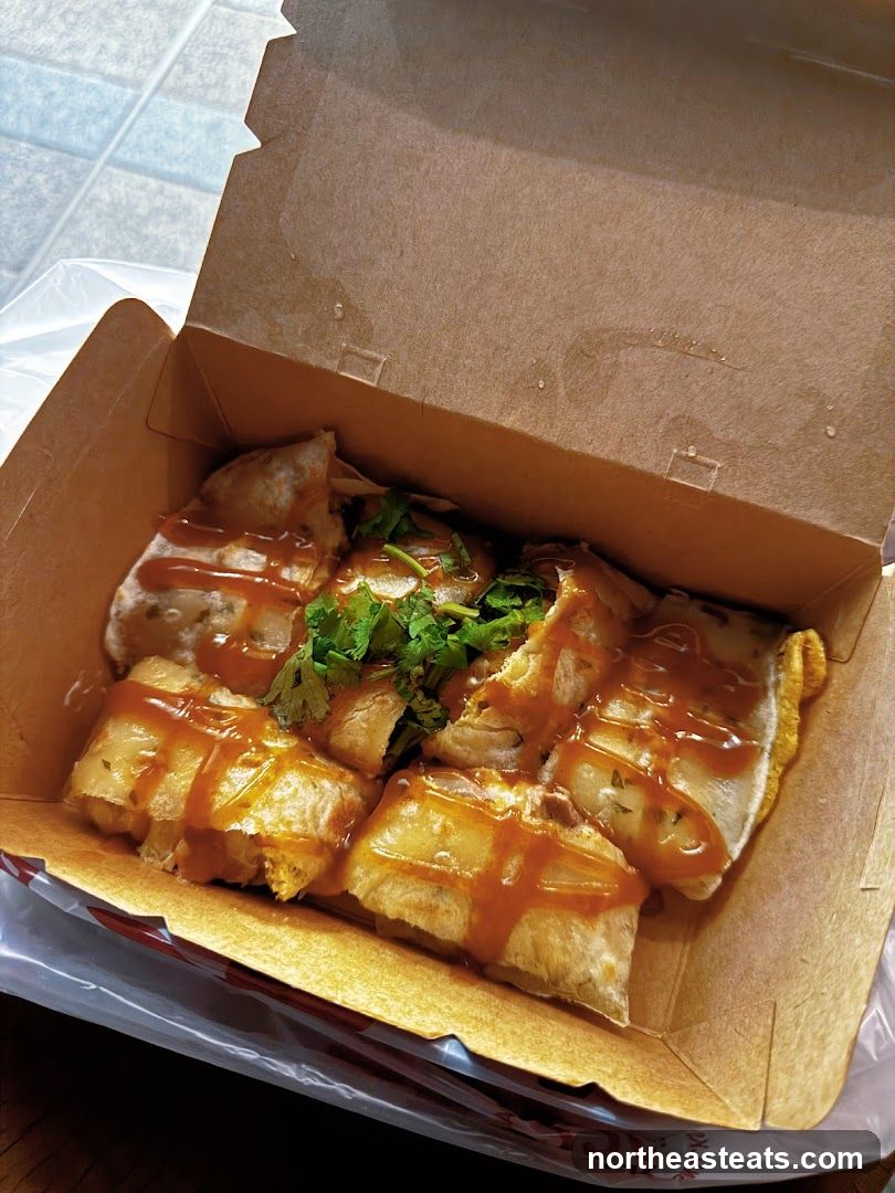Savory Pastry with Sauce and Garnish