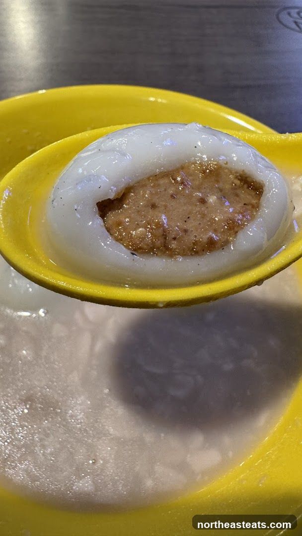 Close-up of a Savory Dumpling in Broth