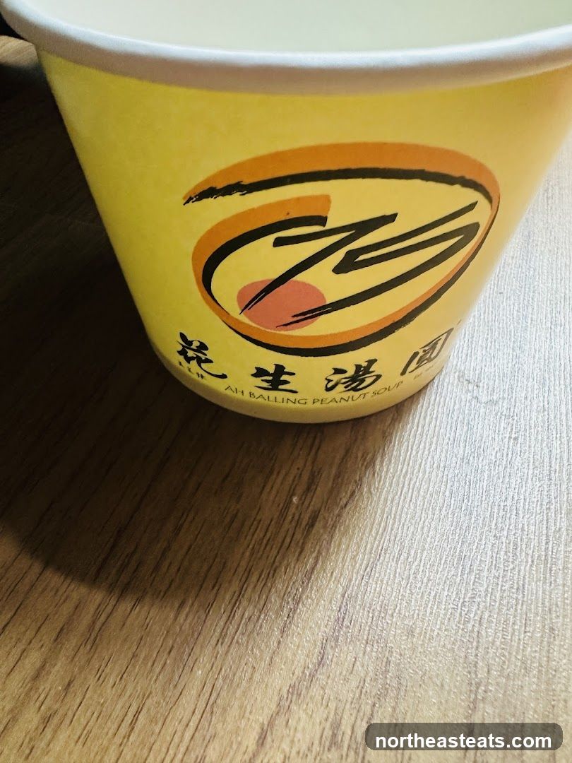Yellow cup with logo