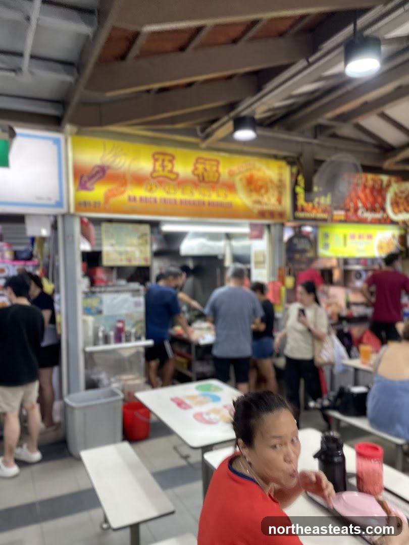 Busy Food Stall with Customers