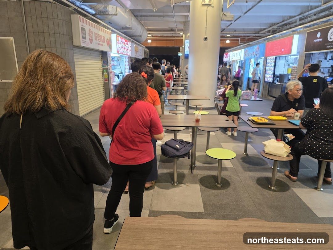 Food court with people queuing