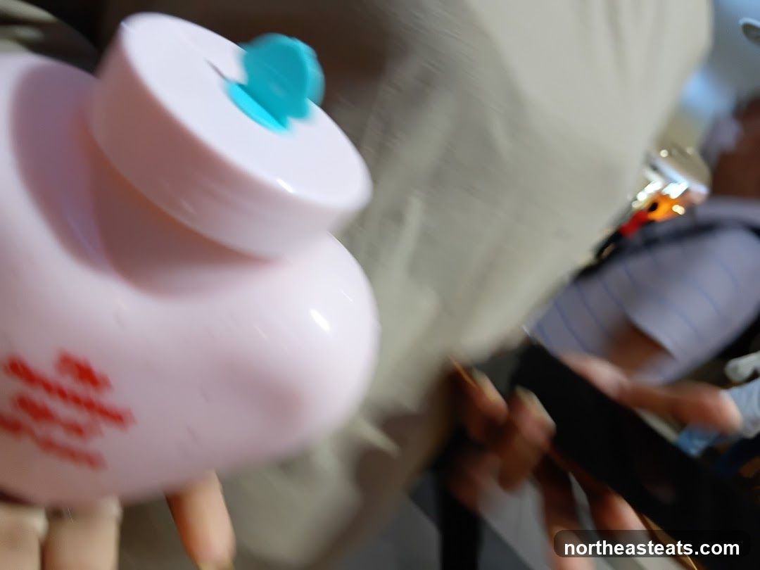 Pink bottle with blue cap