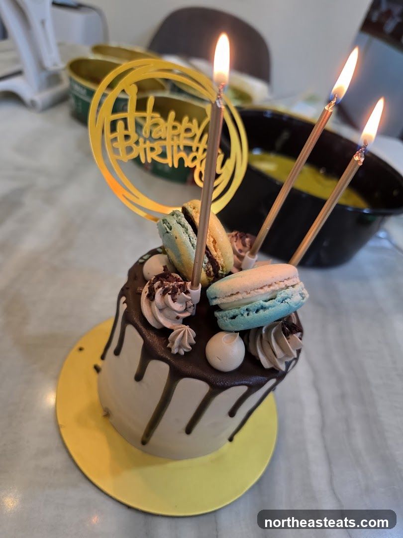 Birthday Cake with Candles and Macarons