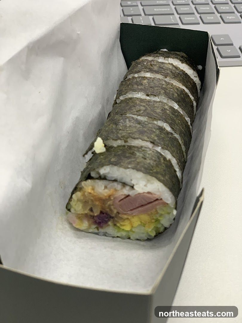 Sushi Roll in Takeout Box