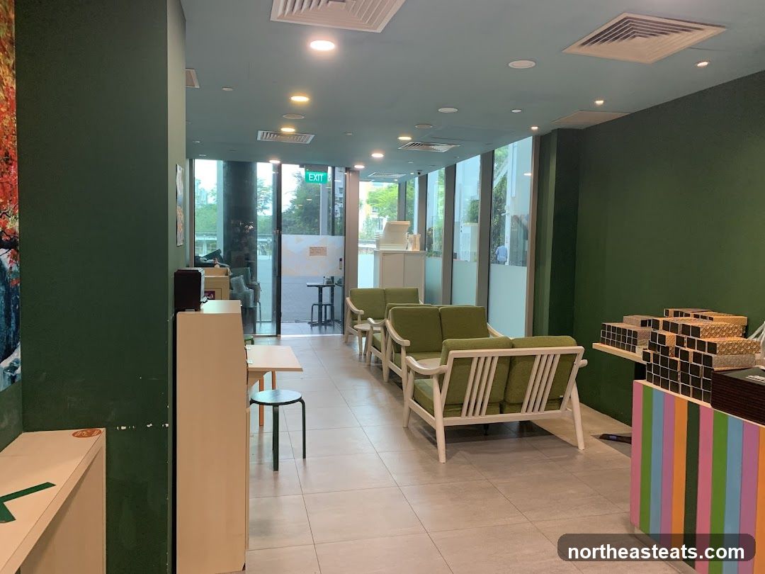 Interior of a cafe with seating and merchandise