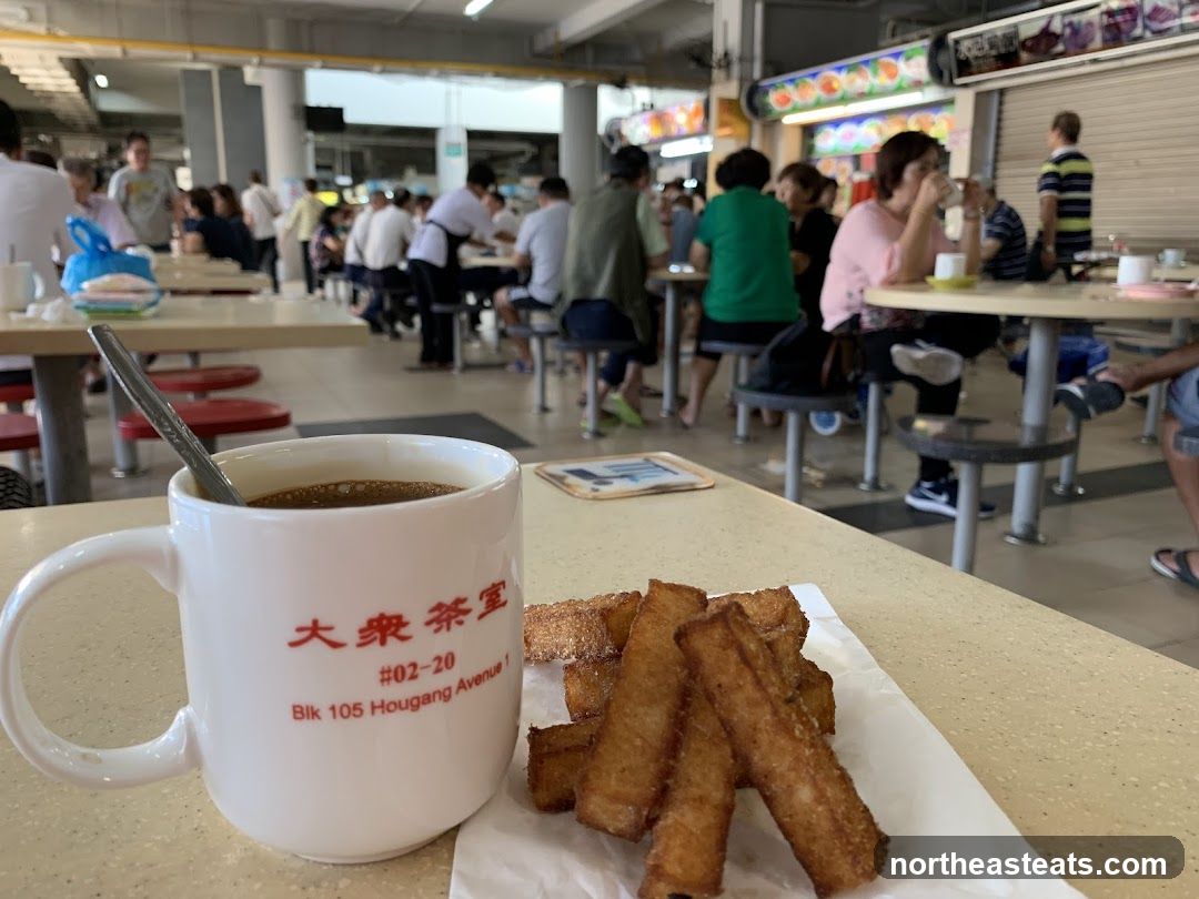 Coffee and Fried Breadsticks at a Food Court