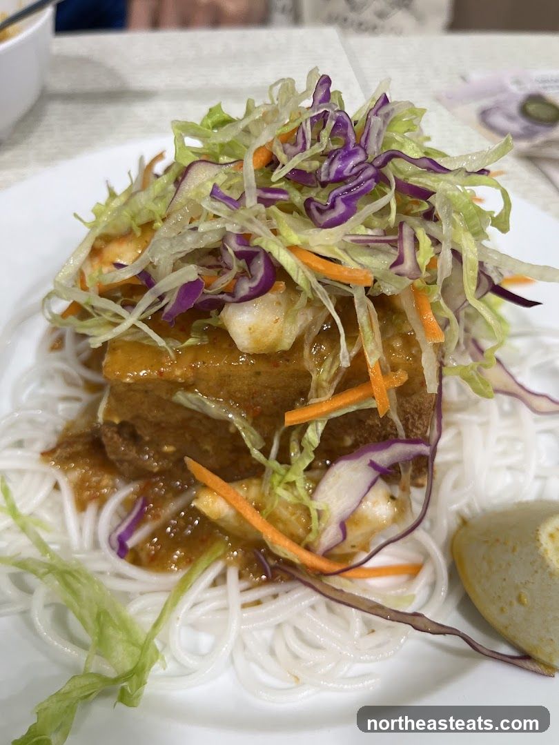 Dish with noodles and salad