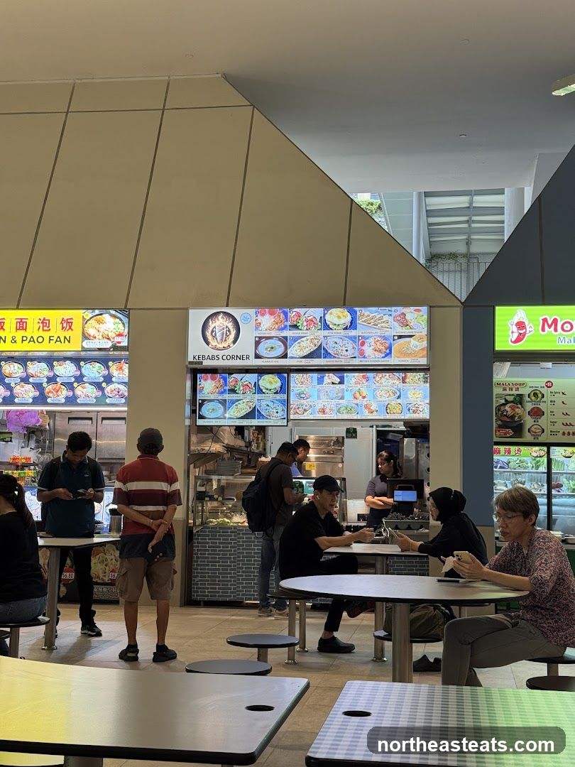 Food court with various stalls and diners
