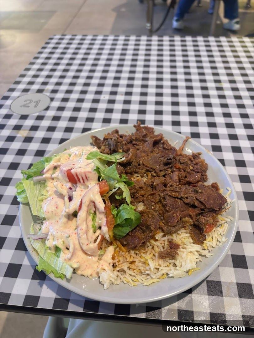 Plate of food on a checkered table
