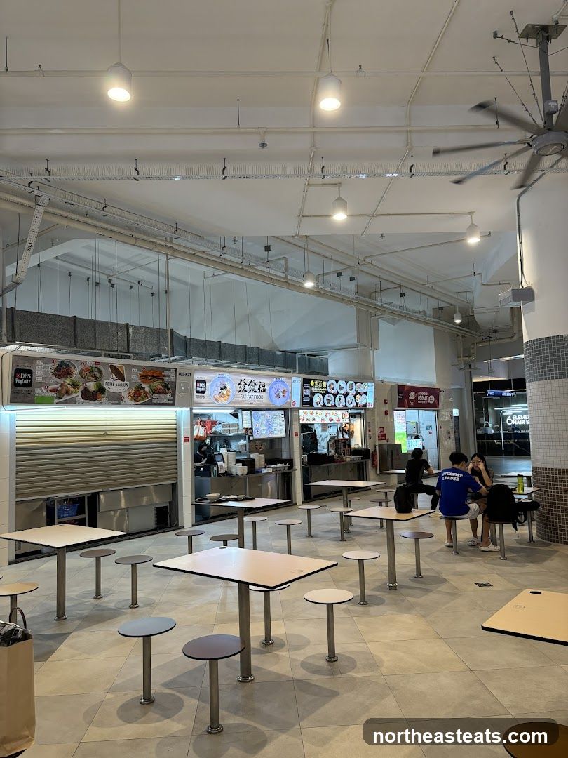 Food court with tables and food stalls