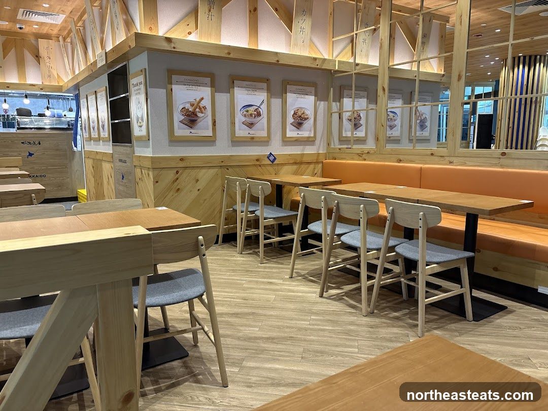 Restaurant Interior with Seating and Menu Displays