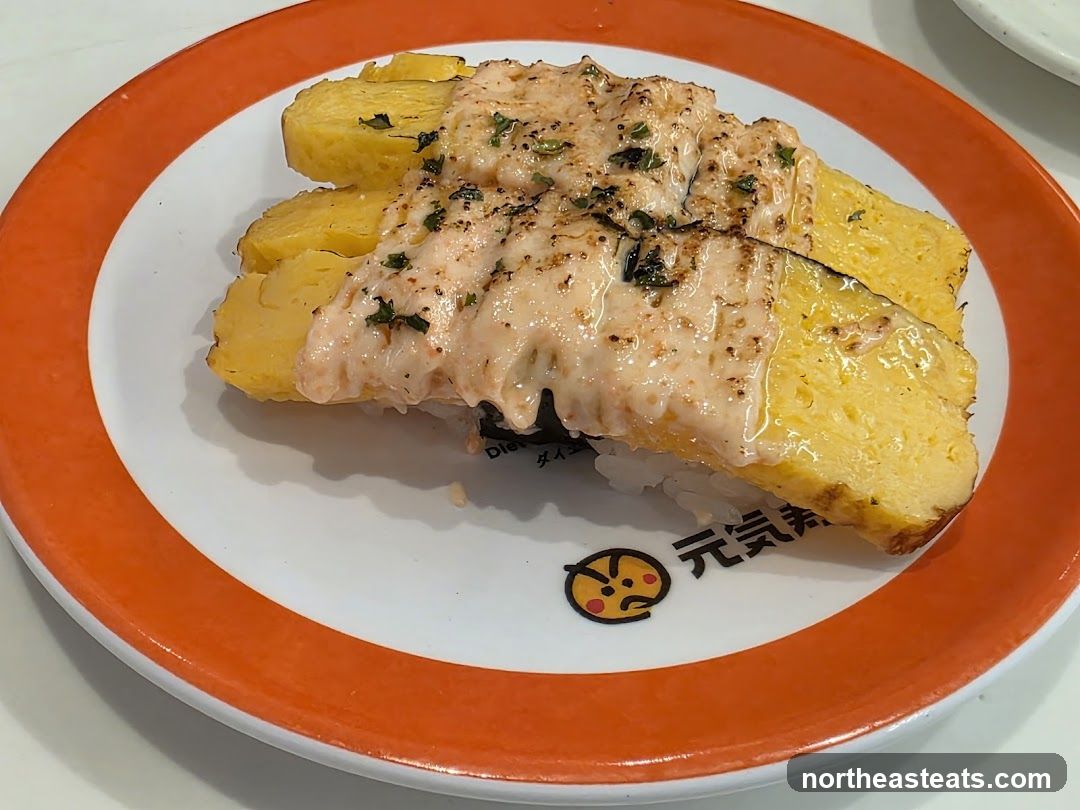 Tamagoyaki Sushi with Salmon and Sauce