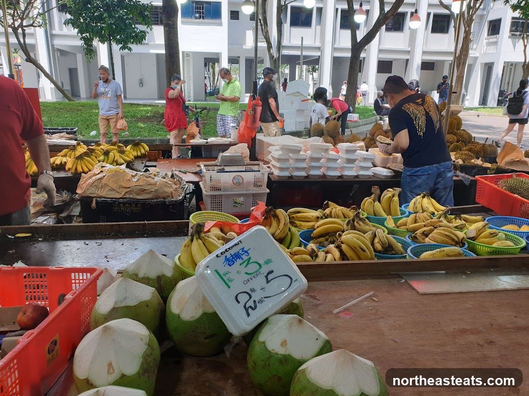 Fruit Stand with Bananas and Coconuts