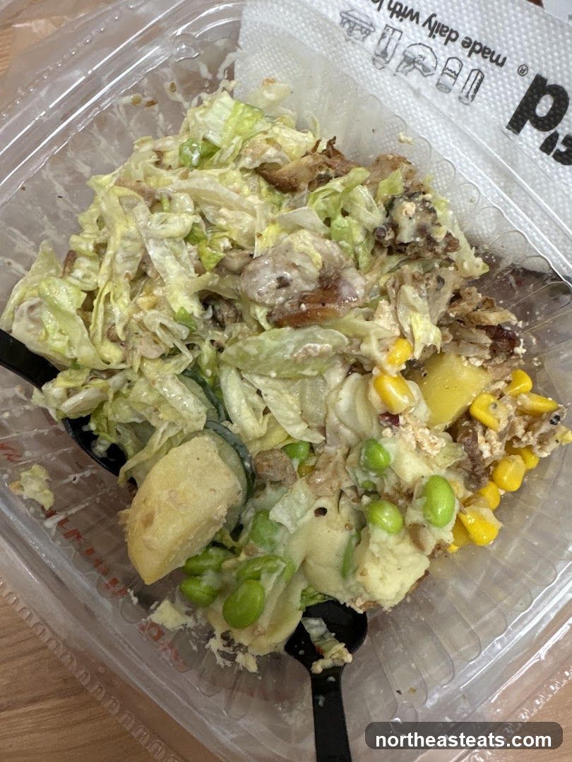 Salad in a plastic container