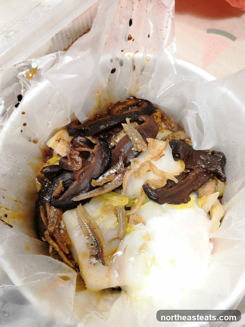 Rice noodle dish with toppings