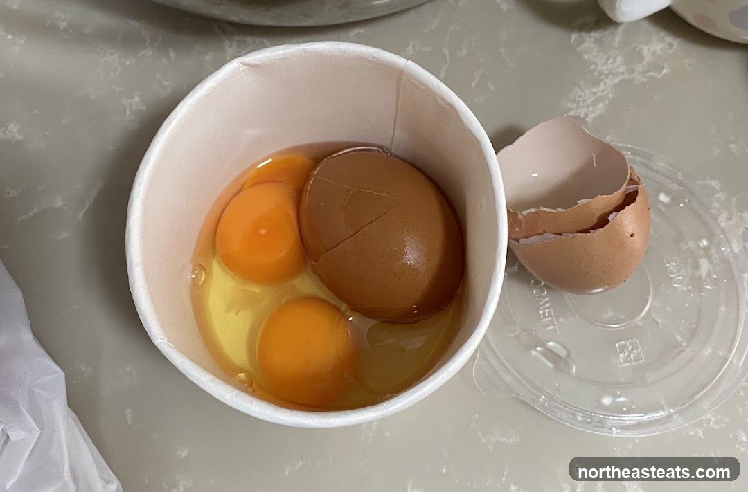 Cracked Eggs in a Cup