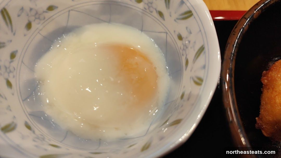 Soft-boiled egg in a bowl