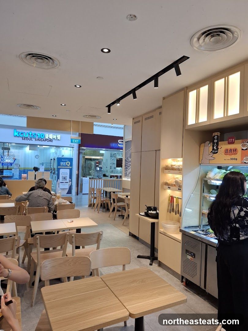 Restaurant Interior with Seating and Food Display