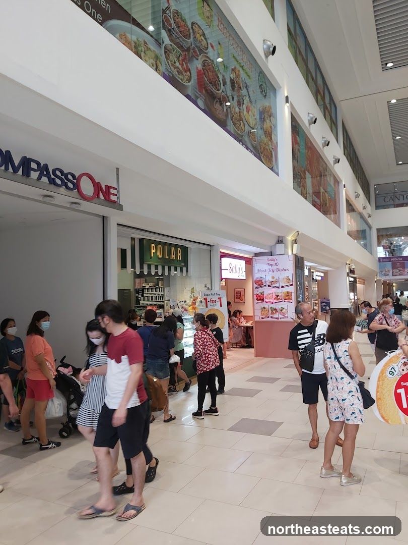 Mall Interior with Shops and Shoppers