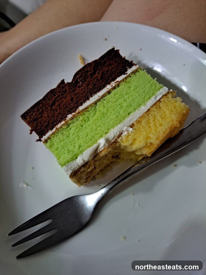 Slice of layered cake on a plate