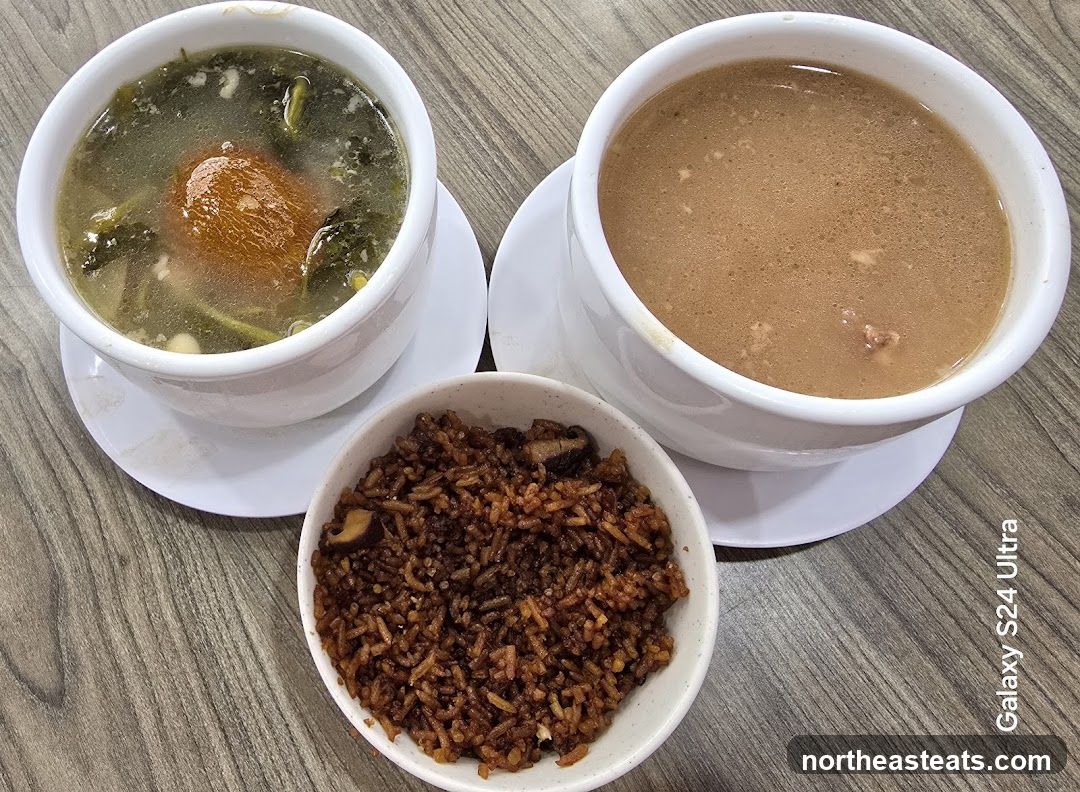 Two bowls of soup and a bowl of rice