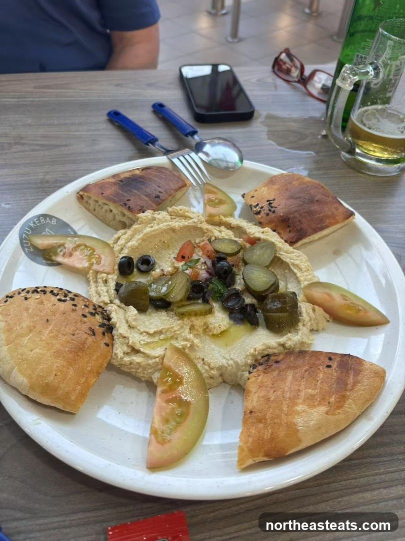 Hummus Platter with Bread and Vegetables