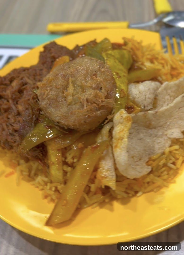 Plate of Rice with Various Toppings
