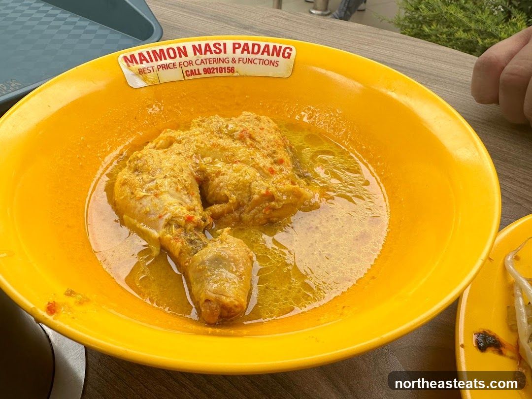 Chicken dish in yellow bowl