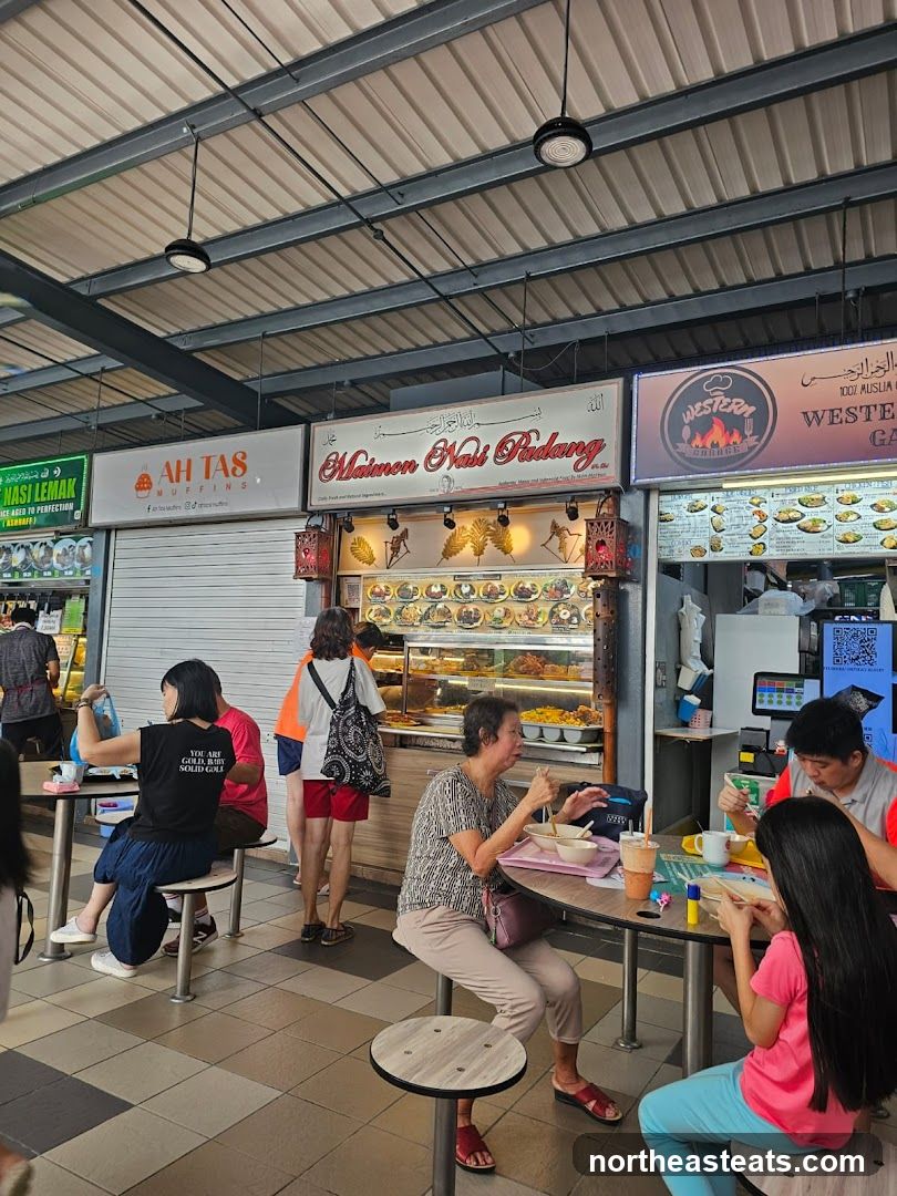 Food court with various stalls and diners