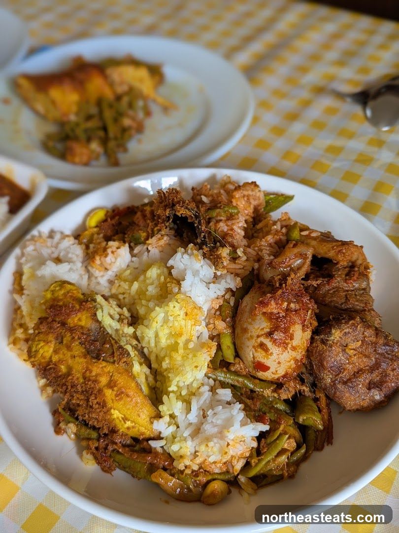 Plate of Rice with Various Toppings