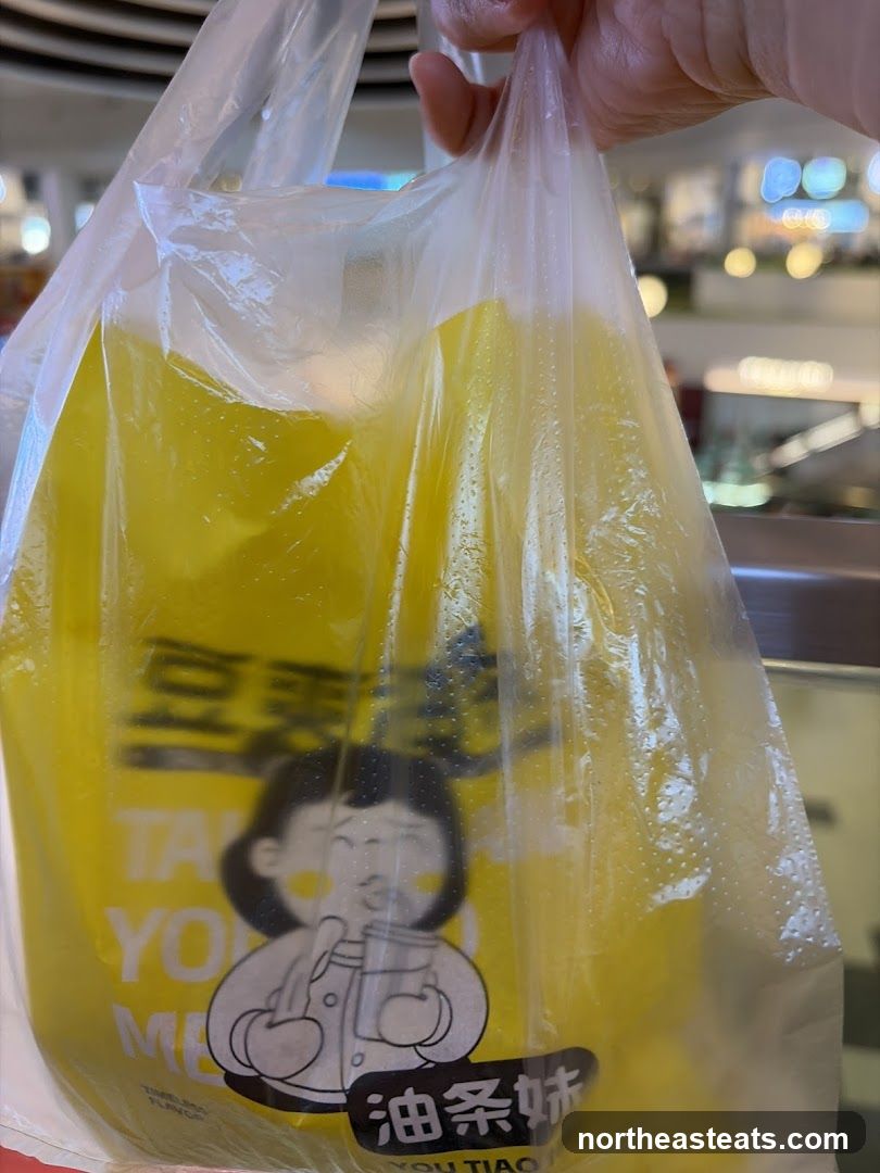Plastic bag with yellow liquid and cartoon character