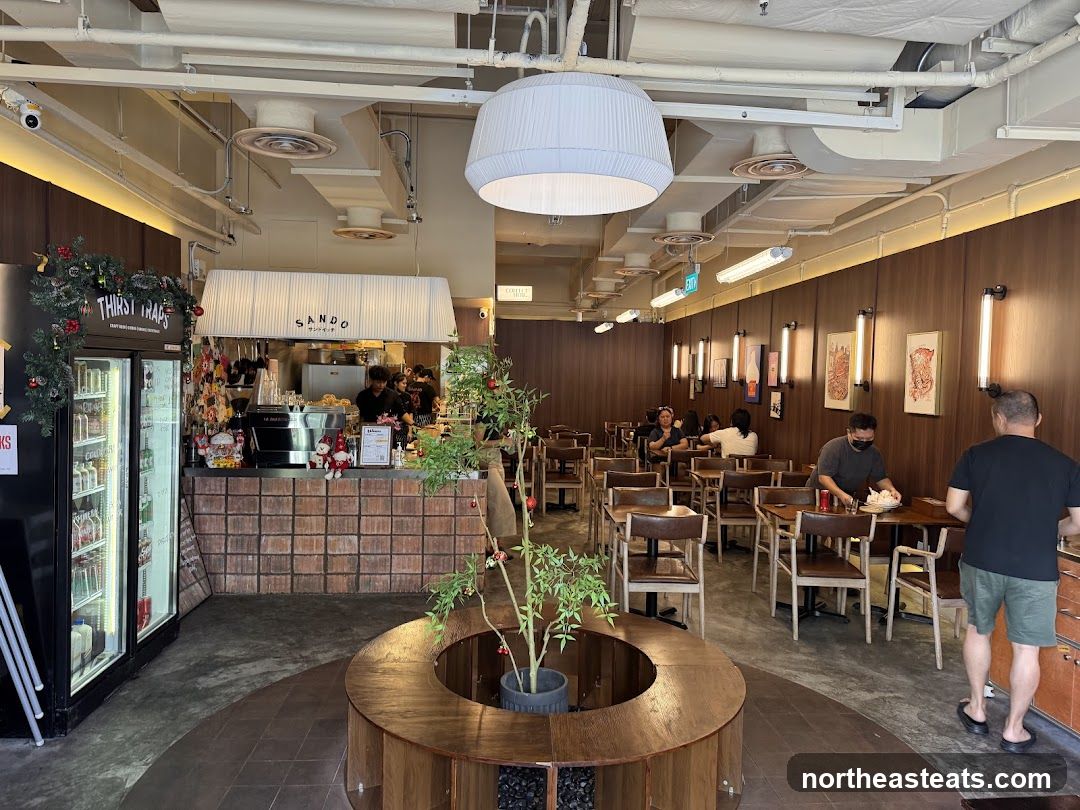 Interior of a cafe with seating and a counter