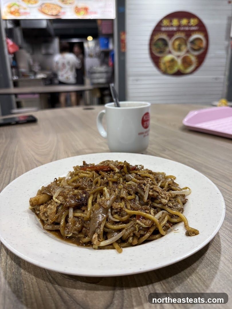 Stir-fried noodles with a drink