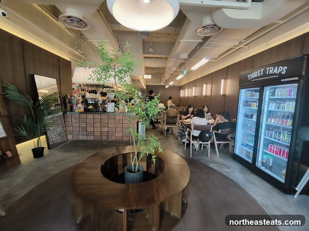 Cafe Interior with Seating and Refrigerator