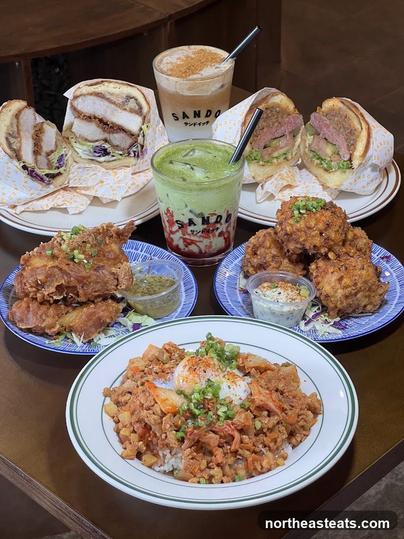 Assortment of Sandwiches, Fried Chicken, and Rice Dishes