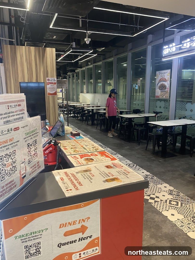 Restaurant Counter with Menu and Seating Area