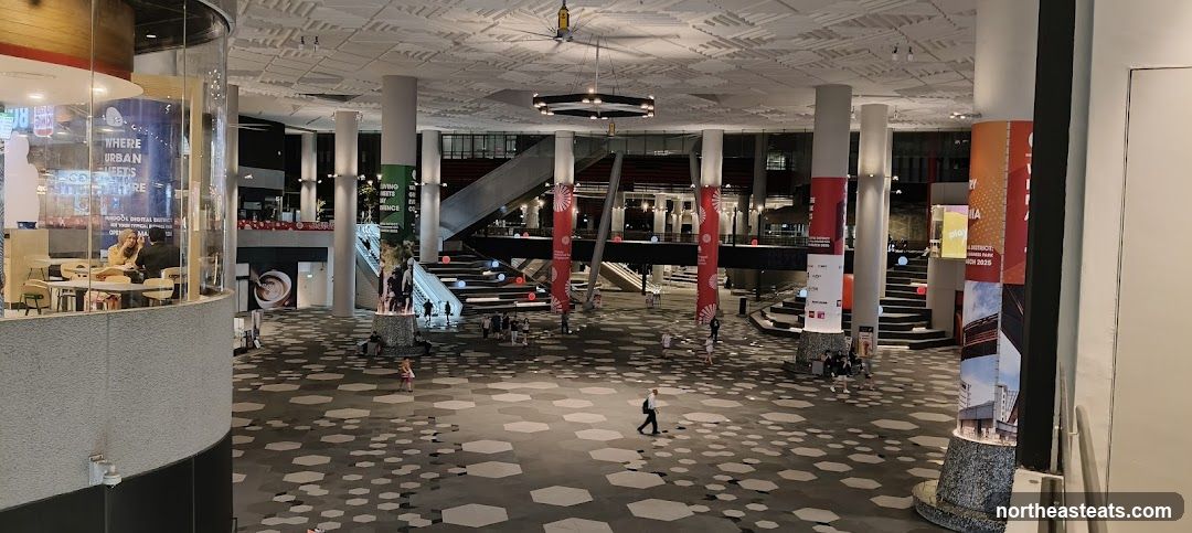 Modern Atrium with Seating and Escalators