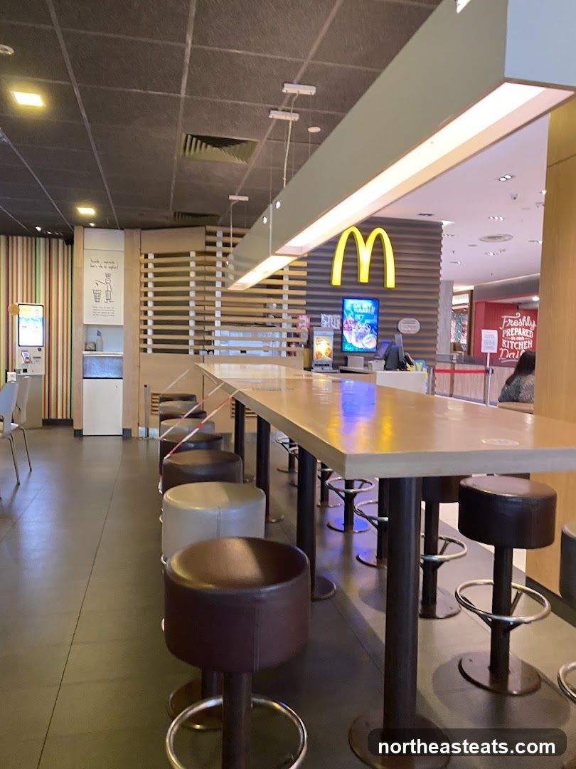 McDonald's Interior with High Tables and Stools